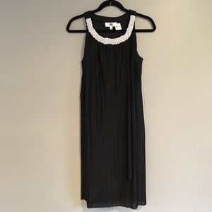 Elegant black accordion pleat cocktail dress NWT.